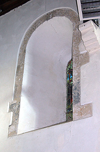 Norman window in the north wall of the nave September 2011